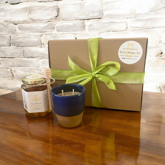 Blue pottery beeswax candle and honey gift box