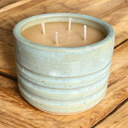 “Serenity” beeswax candle in local pottery