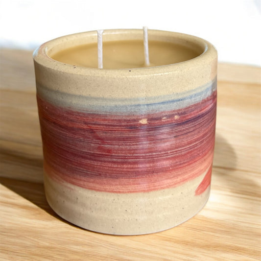 “Sunset Mirage” pure beeswax candle in local pottery