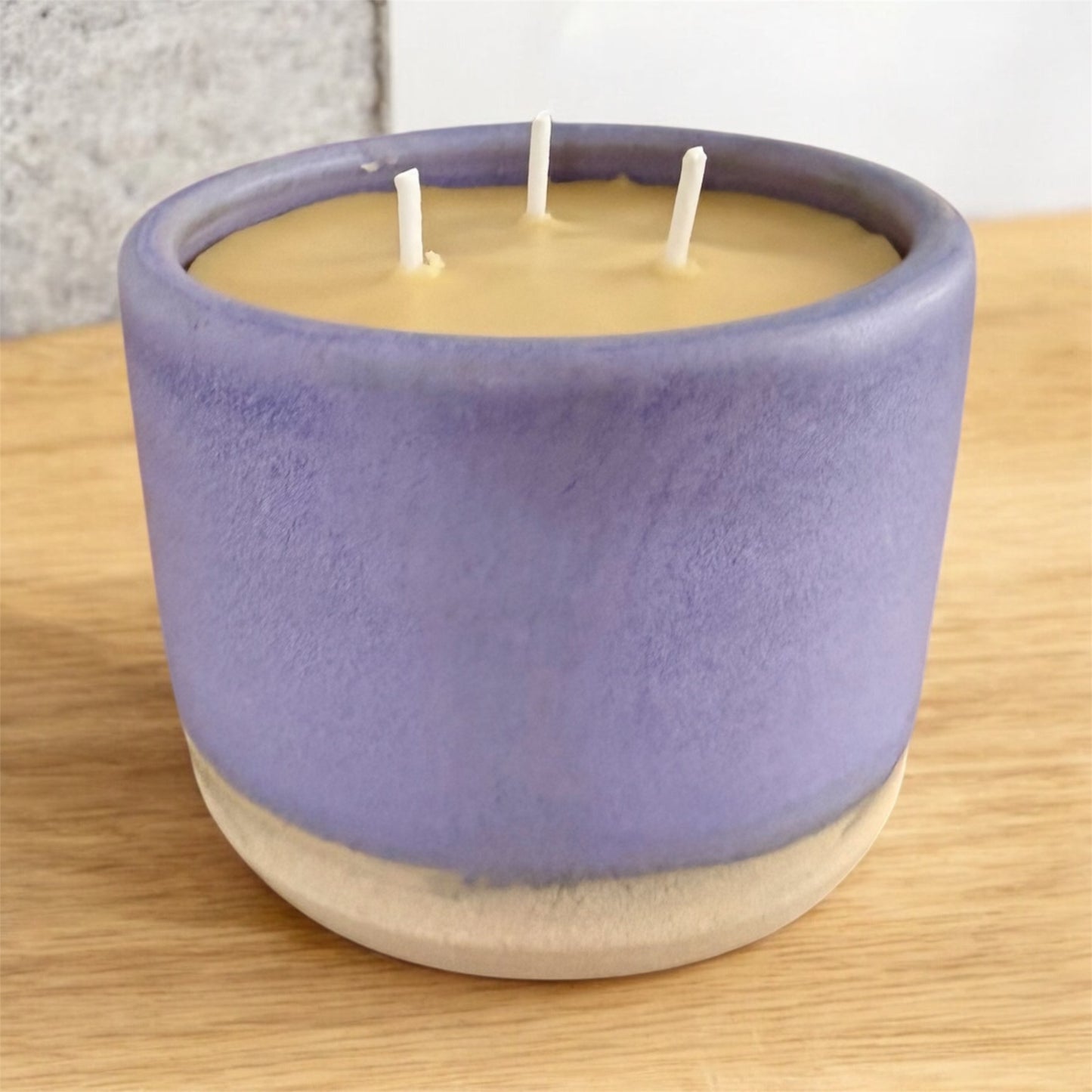 “Lilac Mist” pure beeswax candle in local pottery