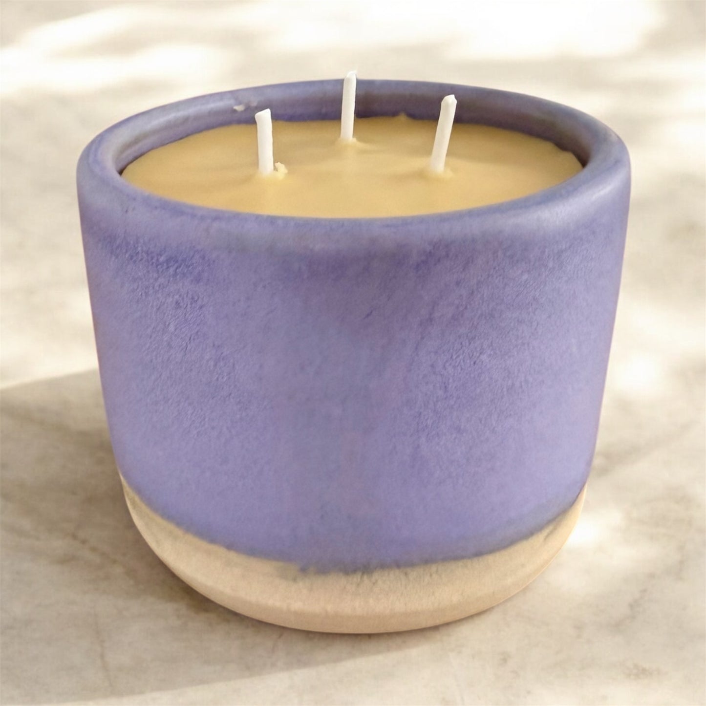 “Lilac Mist” pure beeswax candle in local pottery