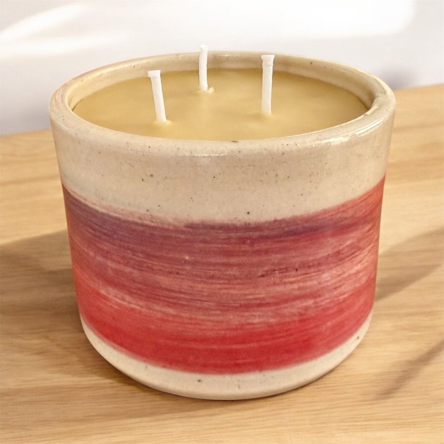 “Autumn Sunset” pure beeswax candle in local pottery